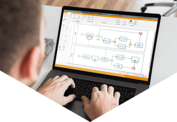 Man on laptop creating business process model in Bizagi Modeler